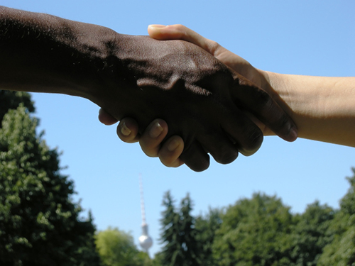 People shaking hands.